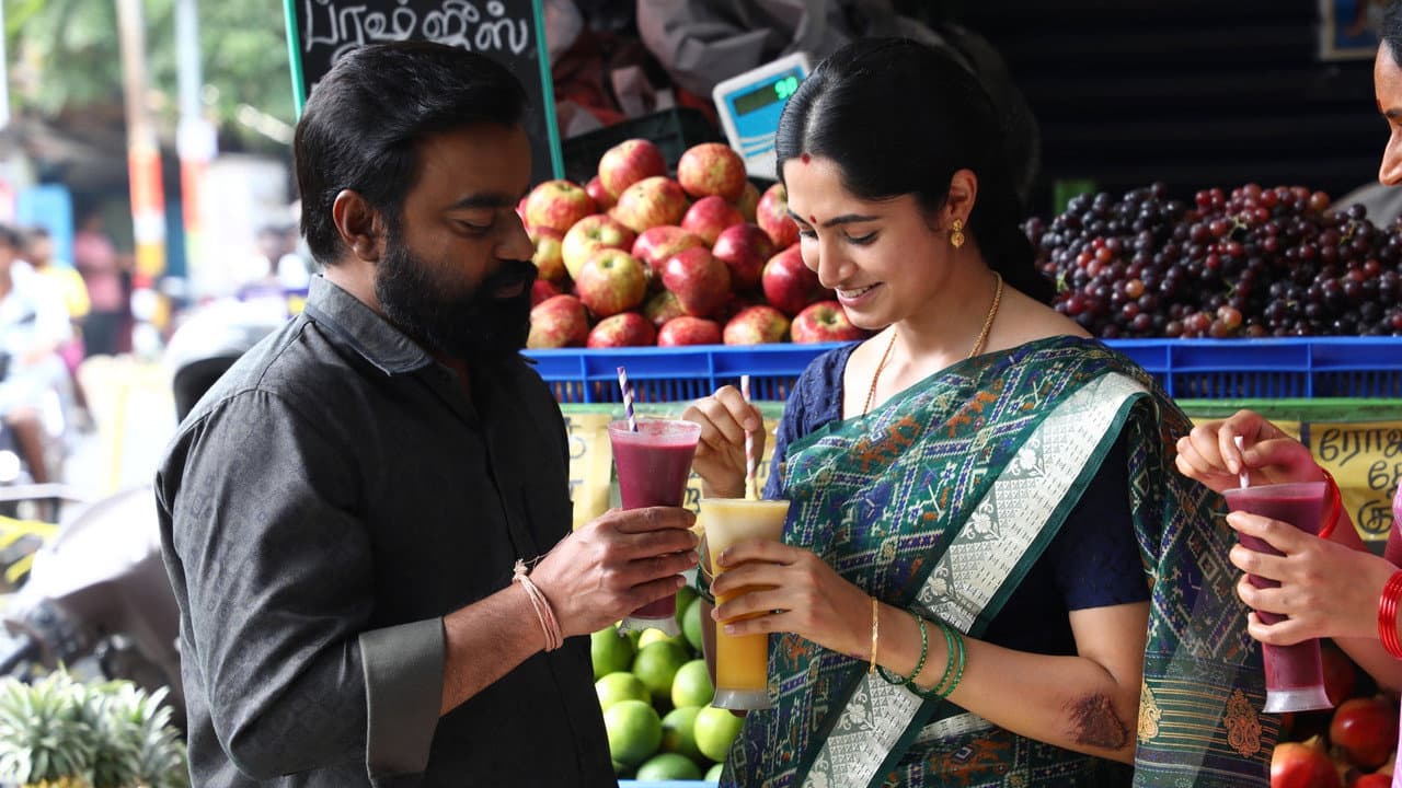 Backdrop phim Manithan Deivamagalam